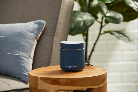 midnight wax melt warmer on table
