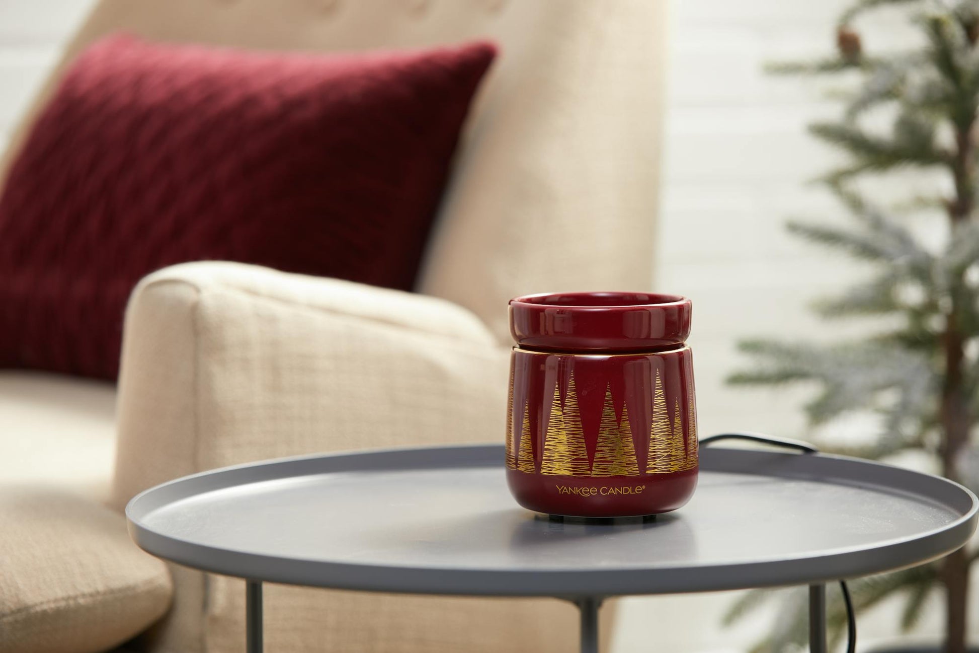 golden pines wax melt warmer on table