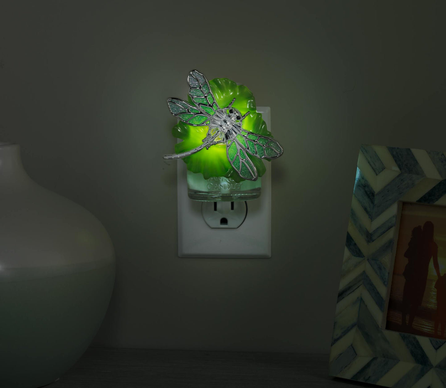 dragonfly on lilypad with light scentplug diffusers in socket