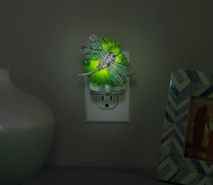 dragonfly on lilypad with light scentplug diffusers in socket