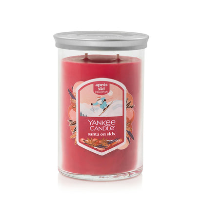 large tumbler candle in santa on skis
