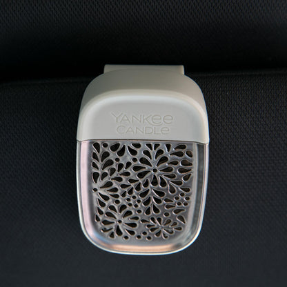 sidekick visor clip in nickel leaf pattern attached to car visor