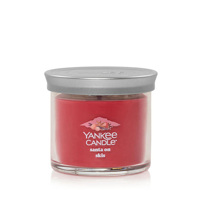 santa on skis small tumbler candle with lid